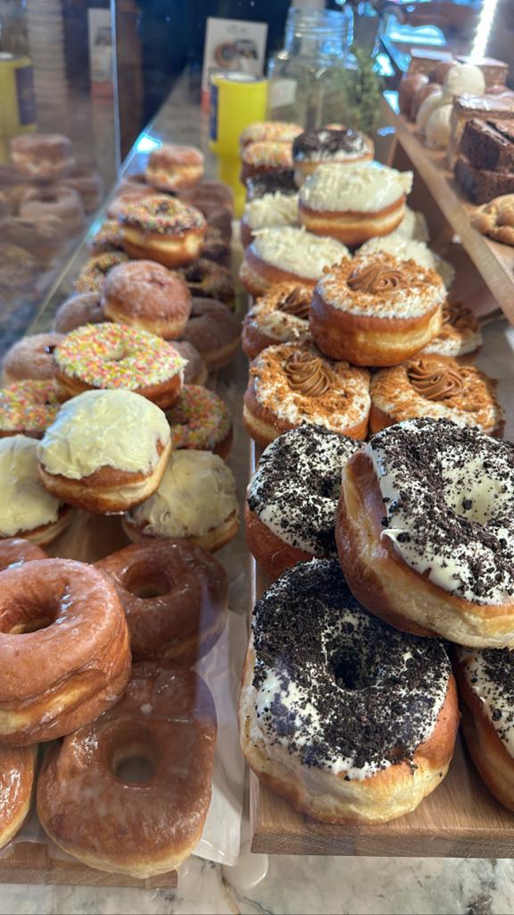 Freshly made donuts, with options including Oreo, Biscoff, sprinkles, and more.